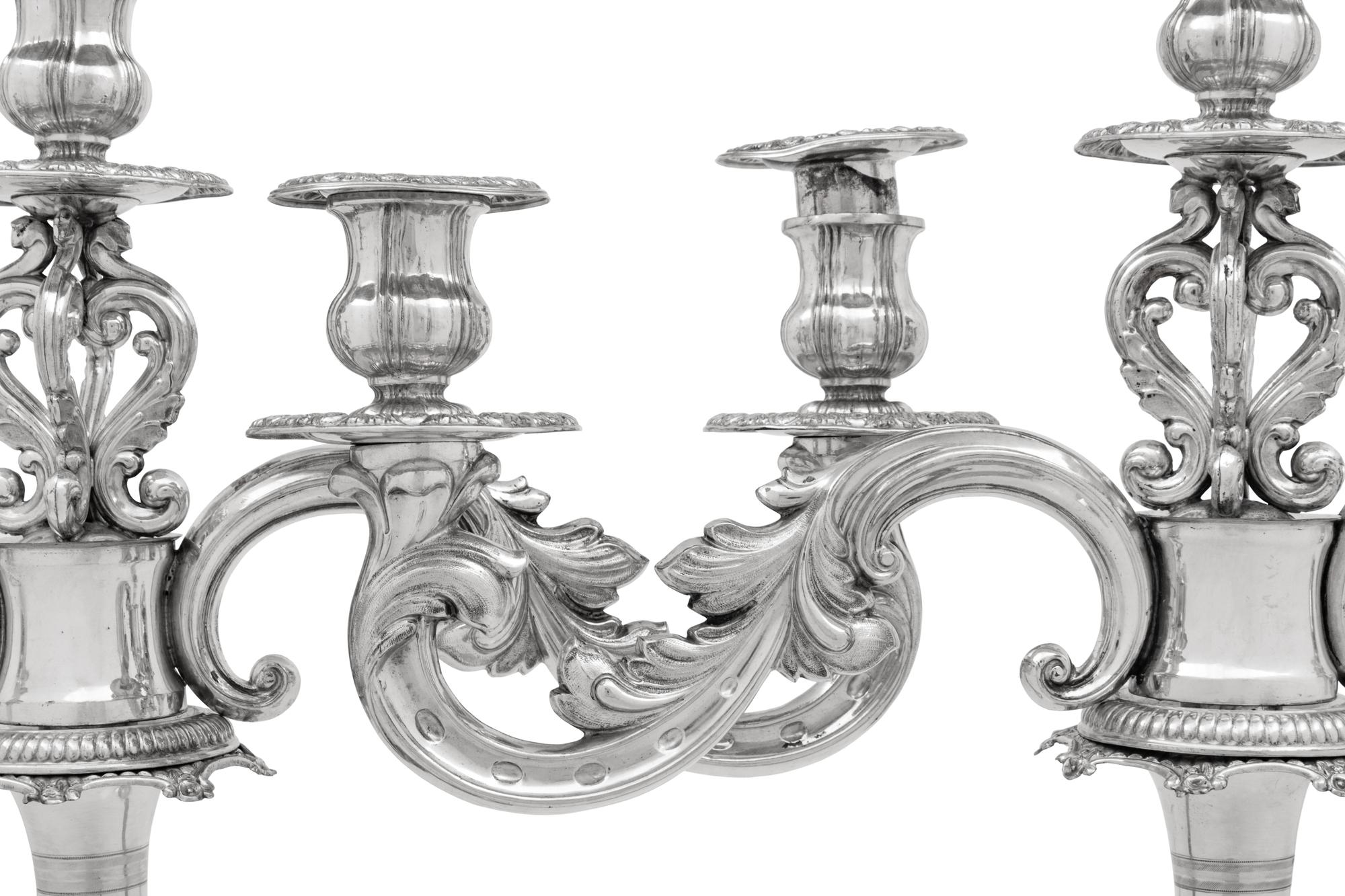 A Pair of Continental Silver Three-Light Candelabra
