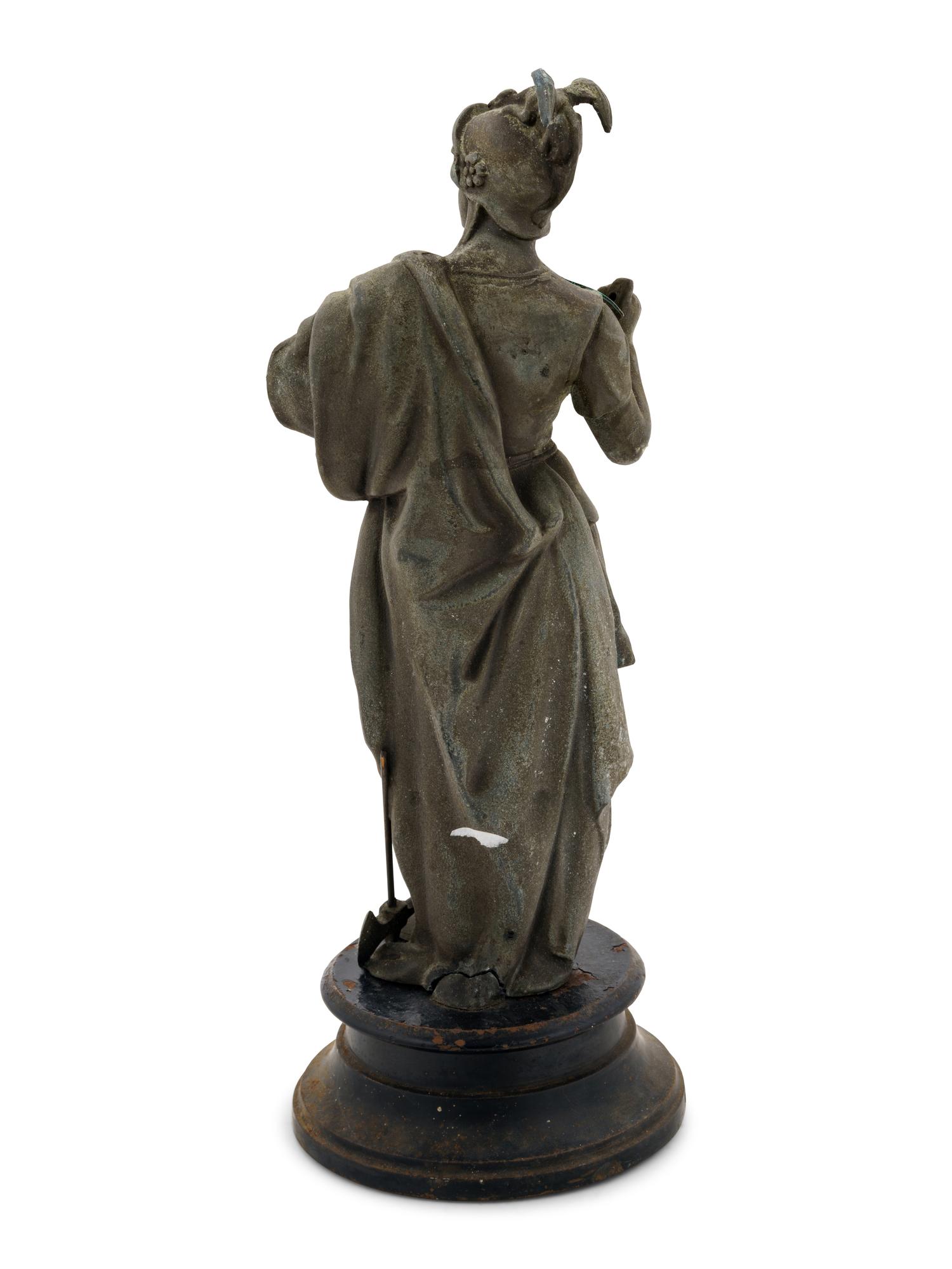 A Cast Metal Figure of Mars