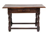 A Jacobean Style Side Table Height 41 x width 23 x depth 25 inches.