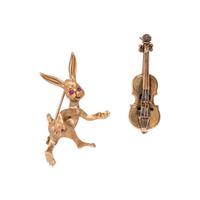 COLLECTION OF GOLD BROOCHES
