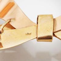A Set of Two 14K Gold Bow Pins