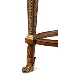 A Louis XVI Style Gilt Bronze Mounted Mahogany Writing Table