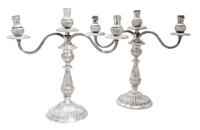 A Pair of Mexican Silver Three-Light Convertible Candelabra, Industria Peruana, having baluster-form stems with reeded arms