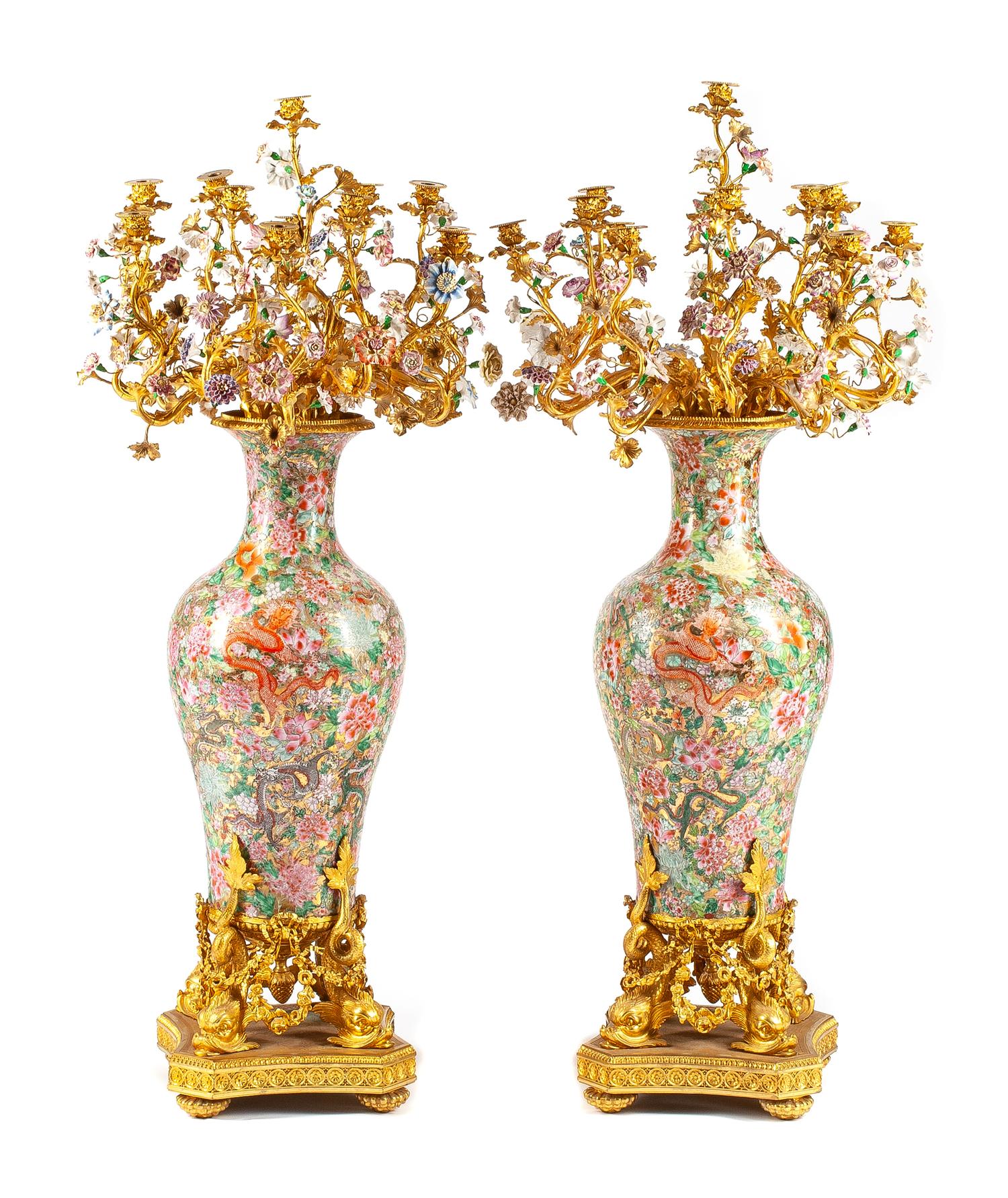 A Pair of Monumental French Gilt Bronze and Porcelain Mounted Candelabra Height 54 inches.