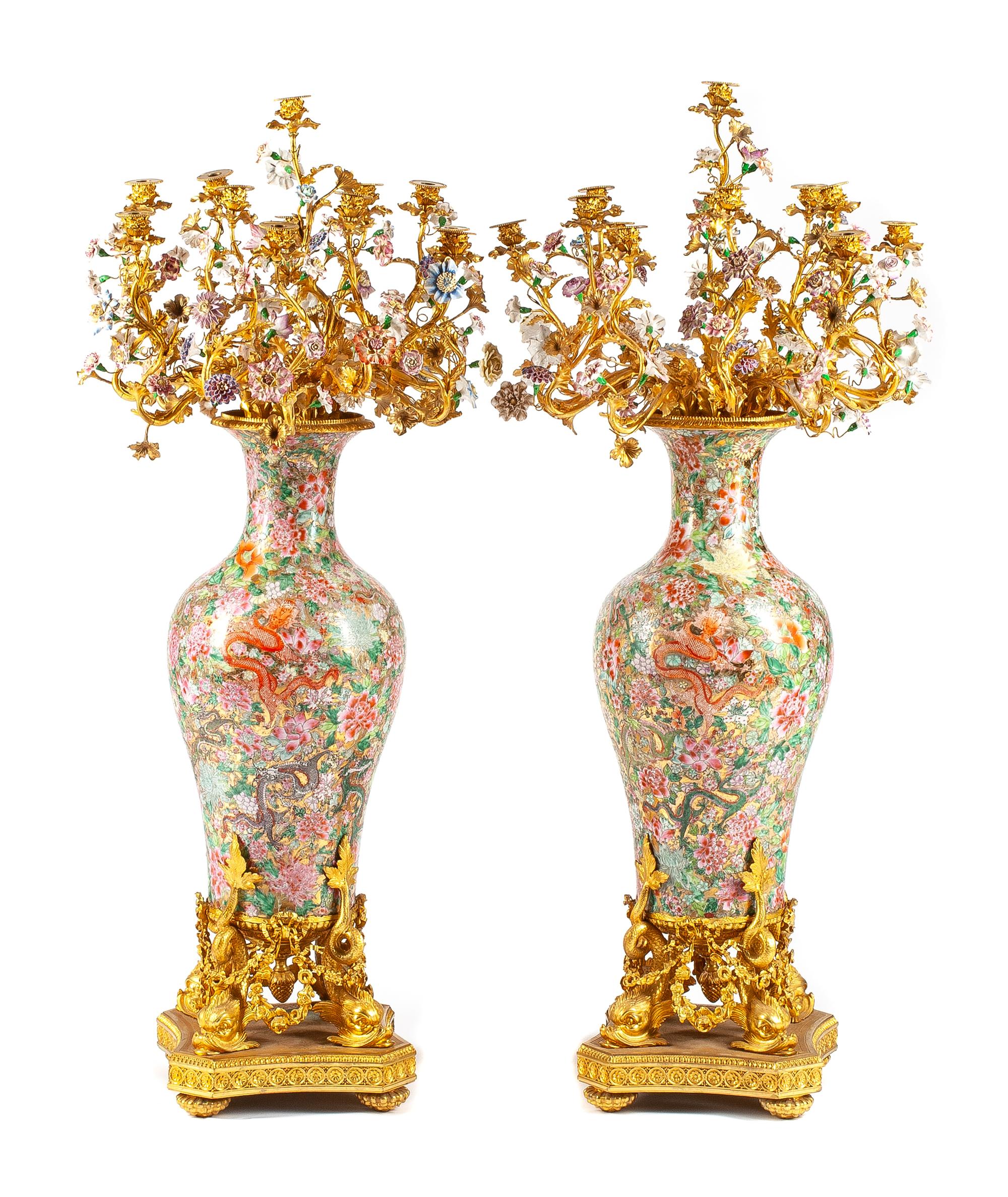 A Pair of Monumental French Gilt Bronze and Porcelain Mounted Candelabra Height 54 inches.