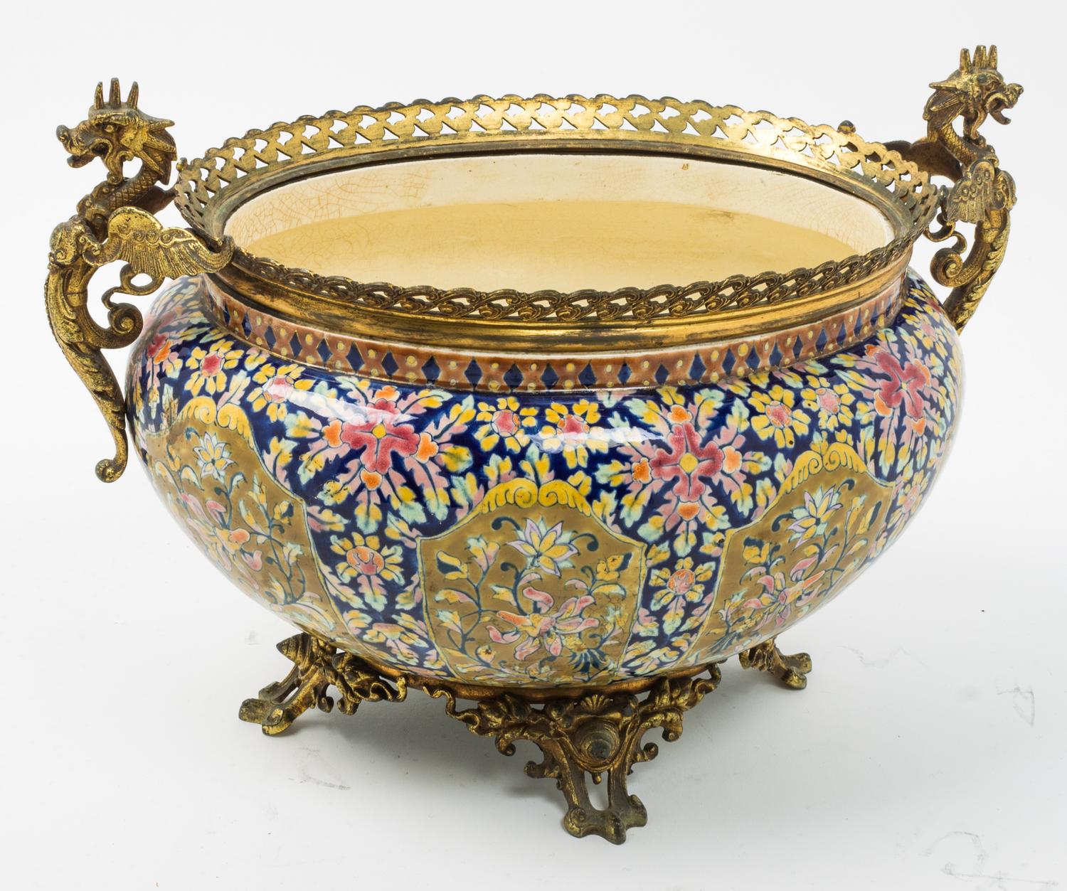 A Continental Gilt Metal Mounted Faience Jardiniere Height 10 1/4 x width 15 inches. — LATE 19TH/EARLY 20TH CENTURY