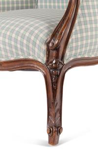 A Louis XV Style Walnut Bergère en Cabriolet
