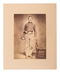 [CIVIL WAR]. Large format albumen copy portrait of an armed artilleryman.