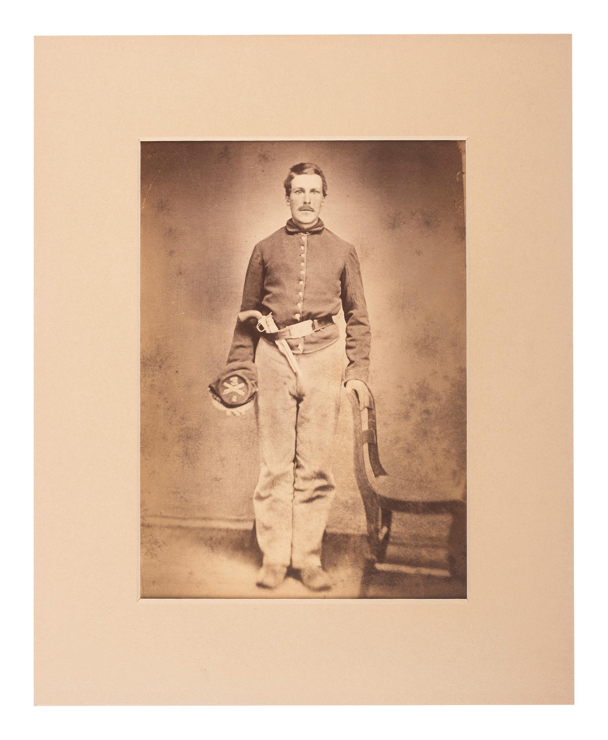 [CIVIL WAR]. Large format albumen copy portrait of an armed artilleryman.