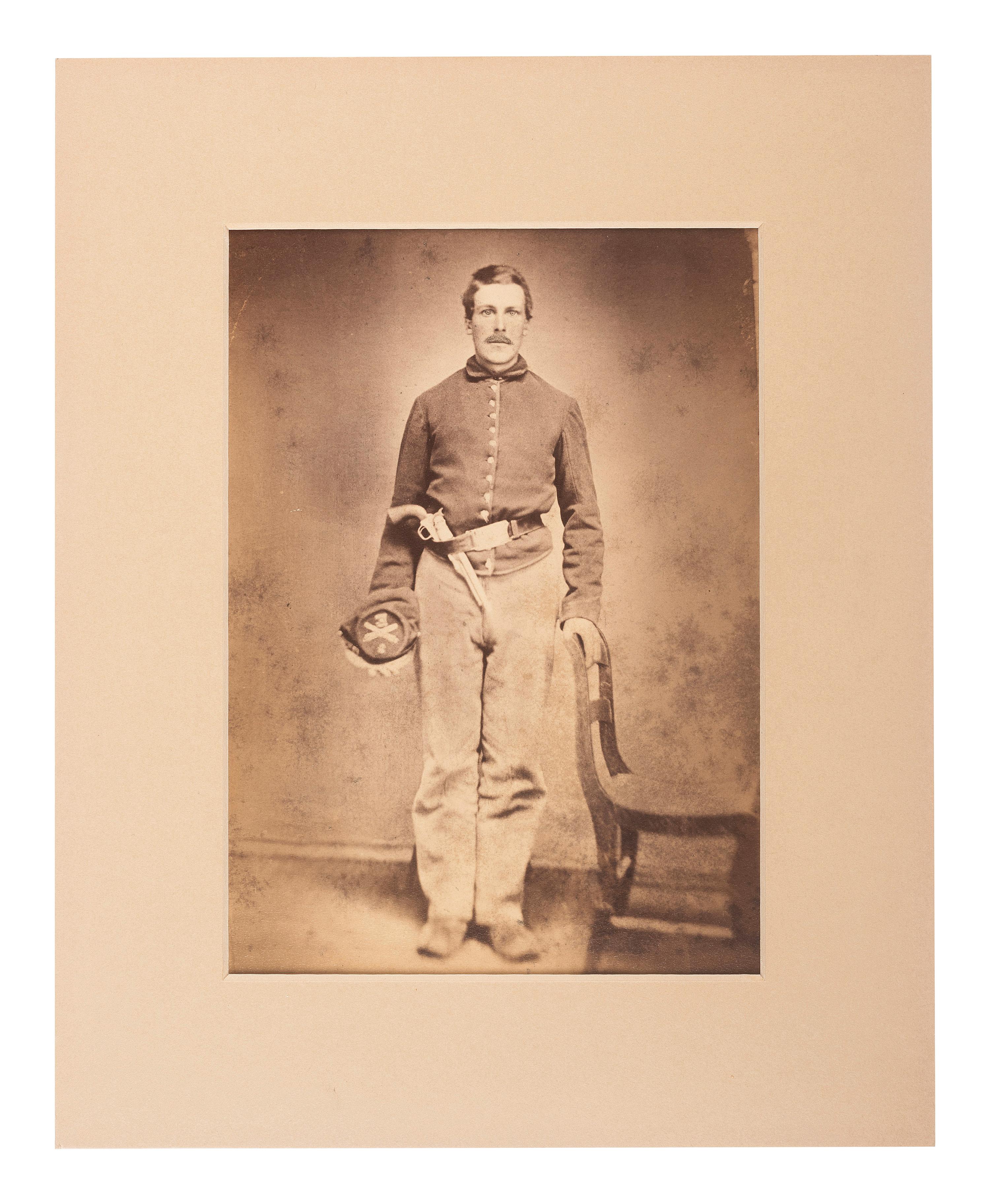 [CIVIL WAR]. Large format albumen copy portrait of an armed artilleryman.