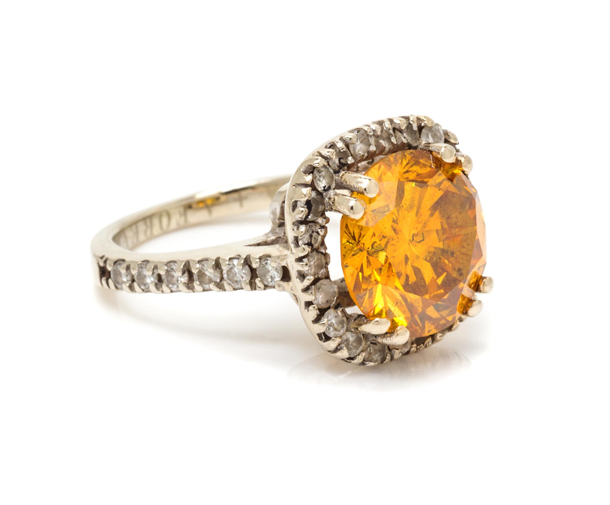 A White Gold, Colored Diamond and Diamond Ring, 3.20 dwts.