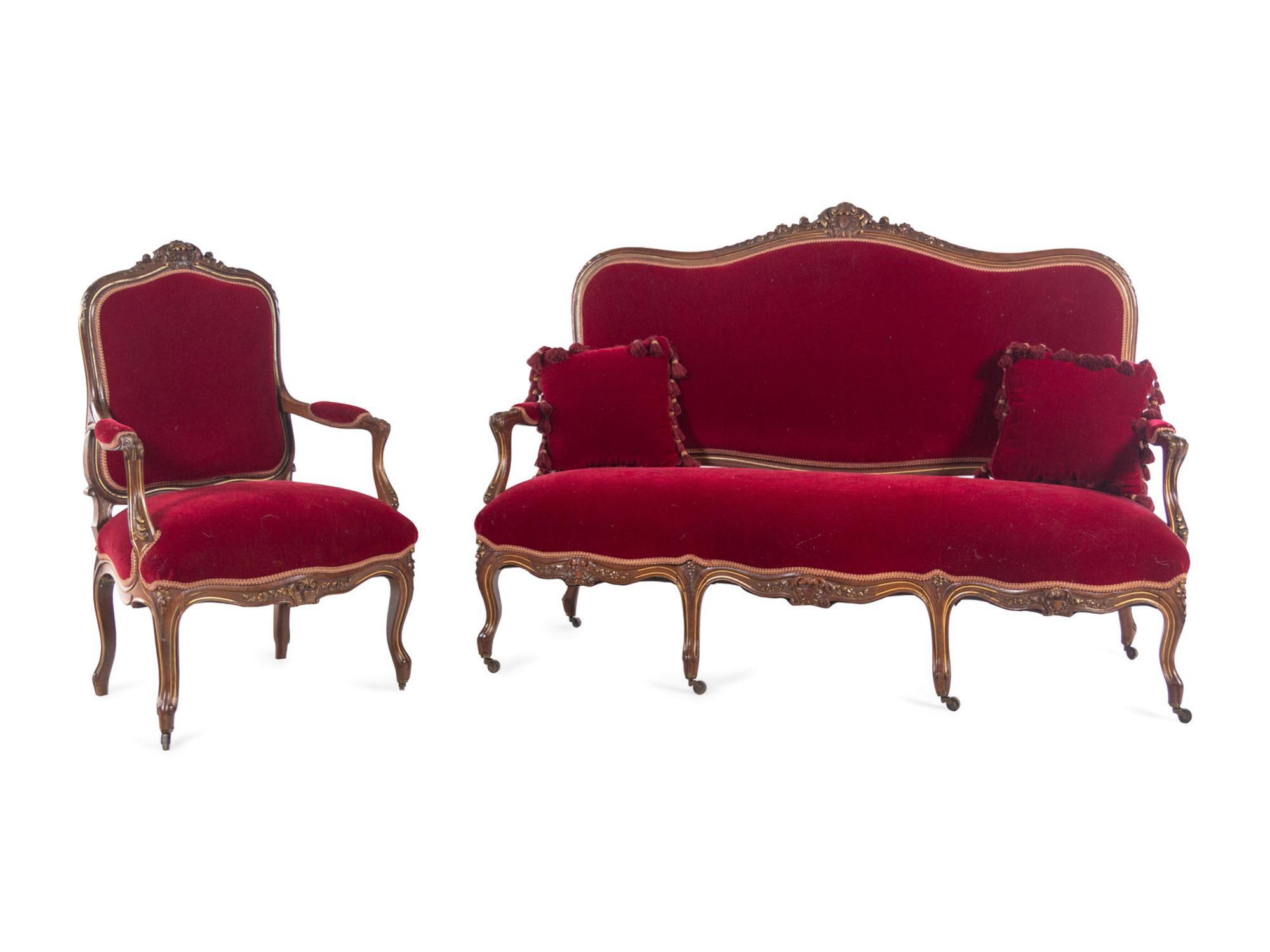 An Italian Louis XV Style Carved and Parcel Gilt Walnut Parlor Suite