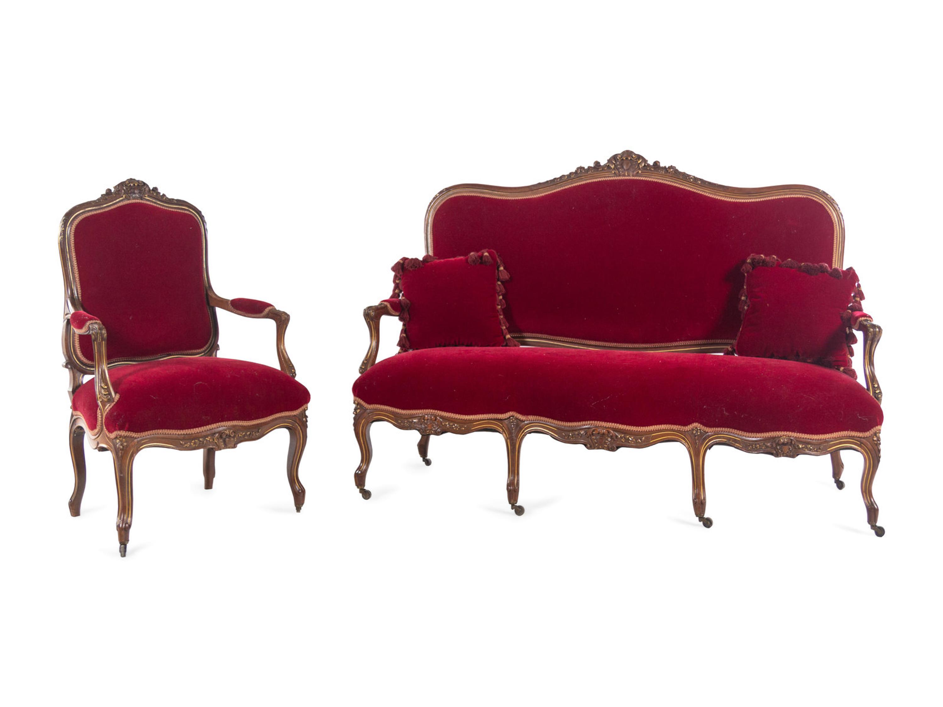 An Italian Louis XV Style Carved and Parcel Gilt Walnut Parlor Suite