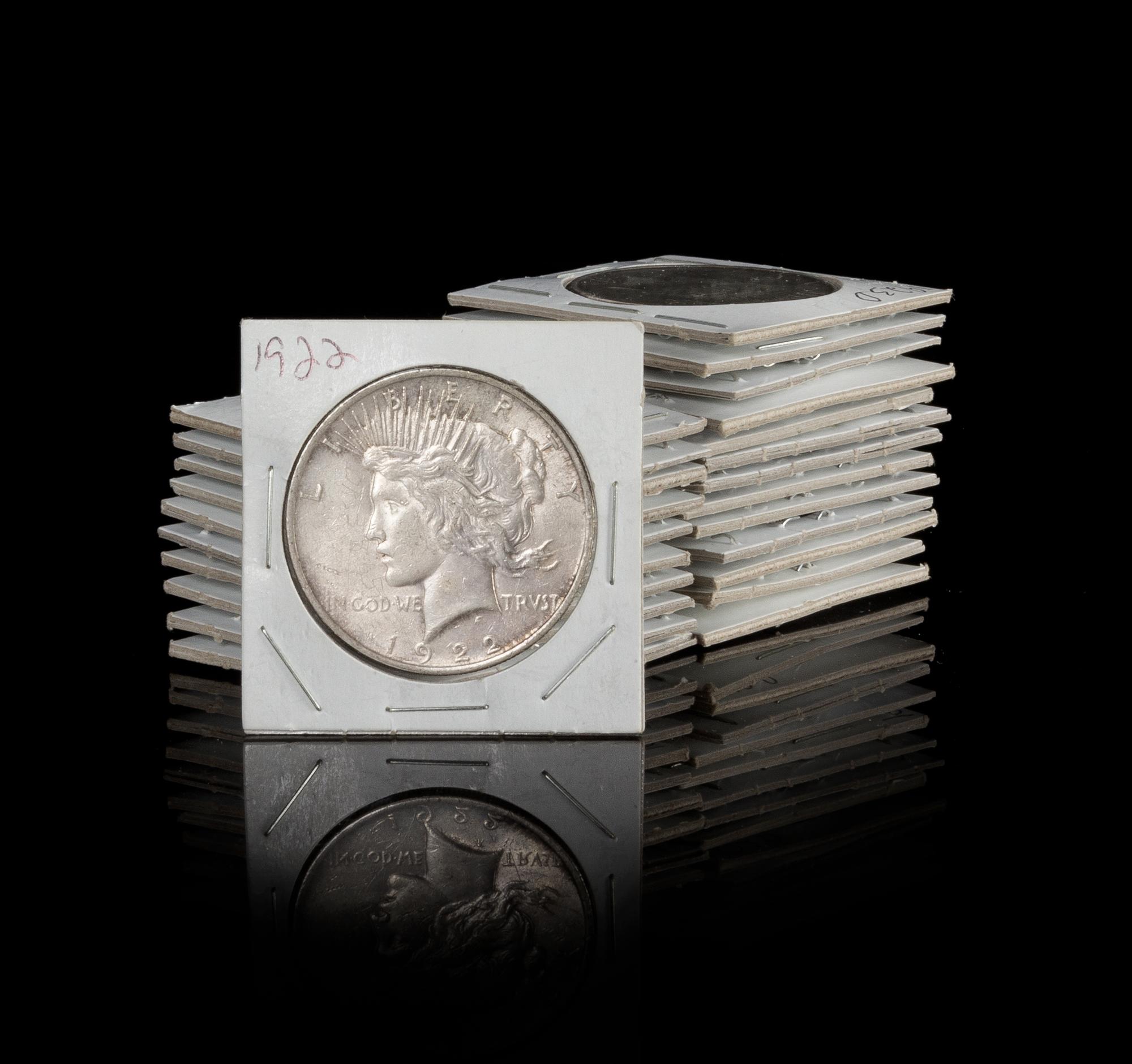 A Collection of 25 United States Peace Silver Dollar Coins