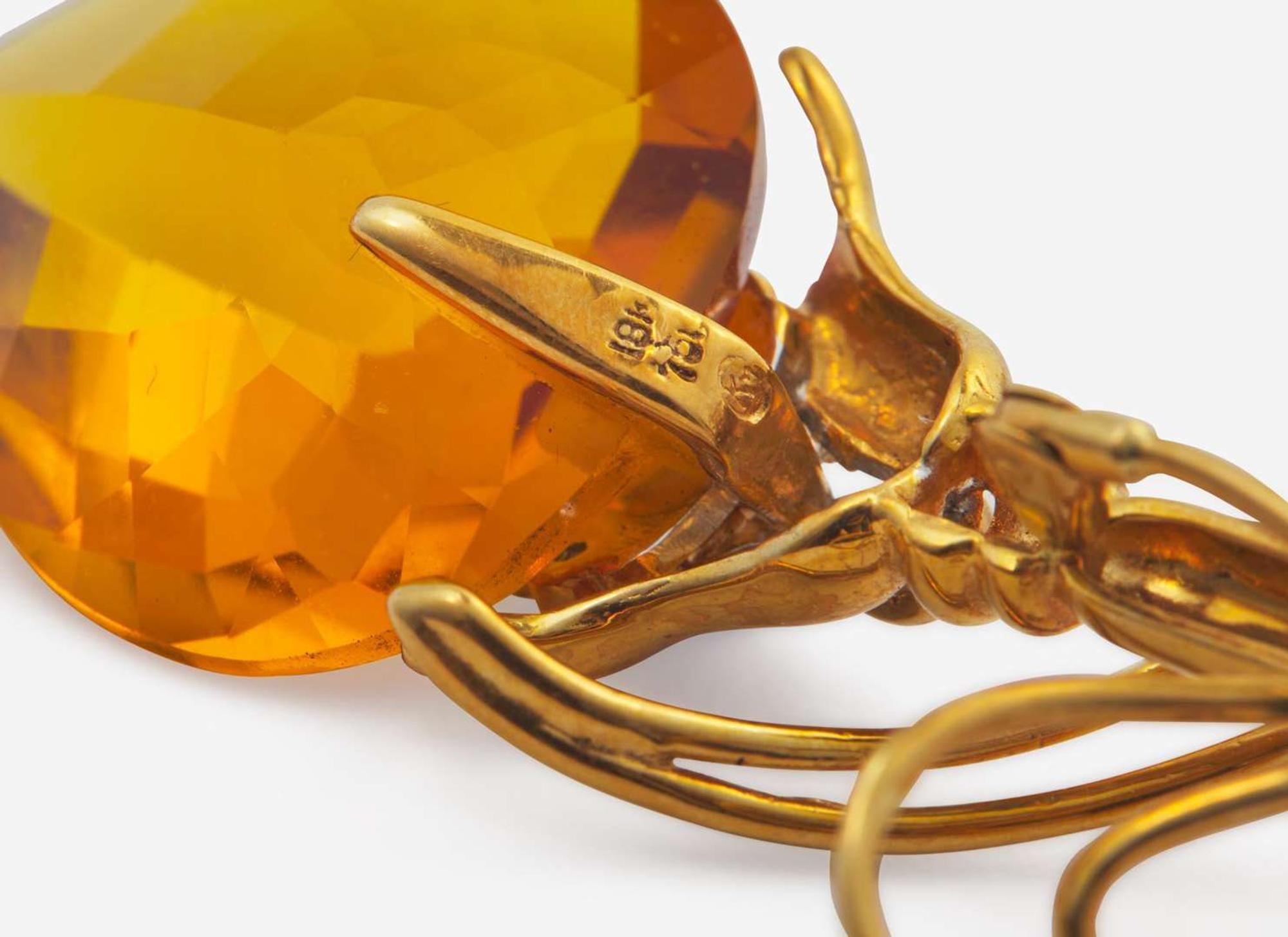 A Pair of Gold and Gemstone Lapel Pins