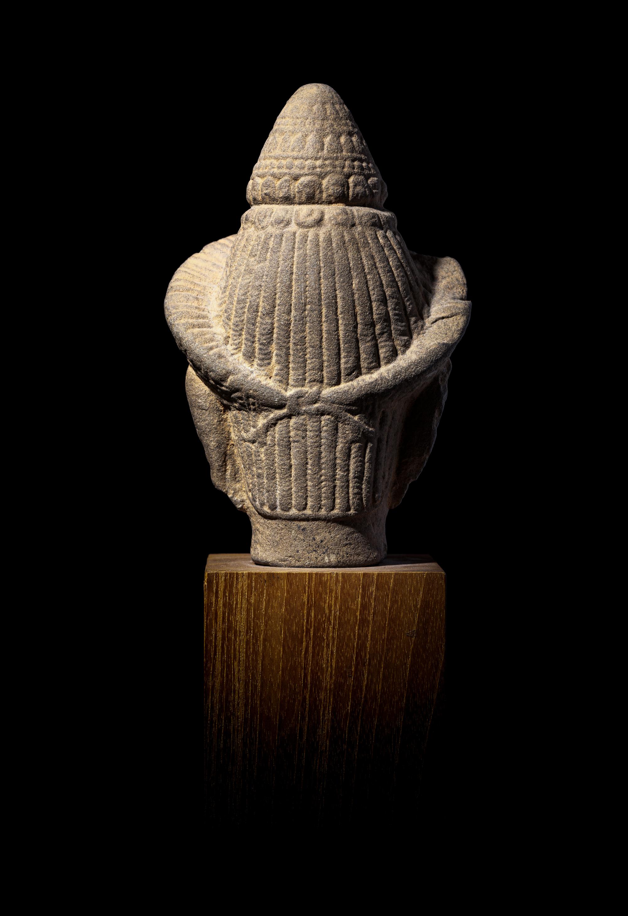 A Khmer Sandstone Head of a Deity