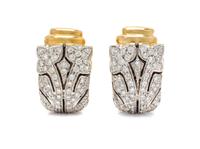 A Pair of 18 Karat Bicolor Gold and Diamond Earclips, 9.20 dwts.