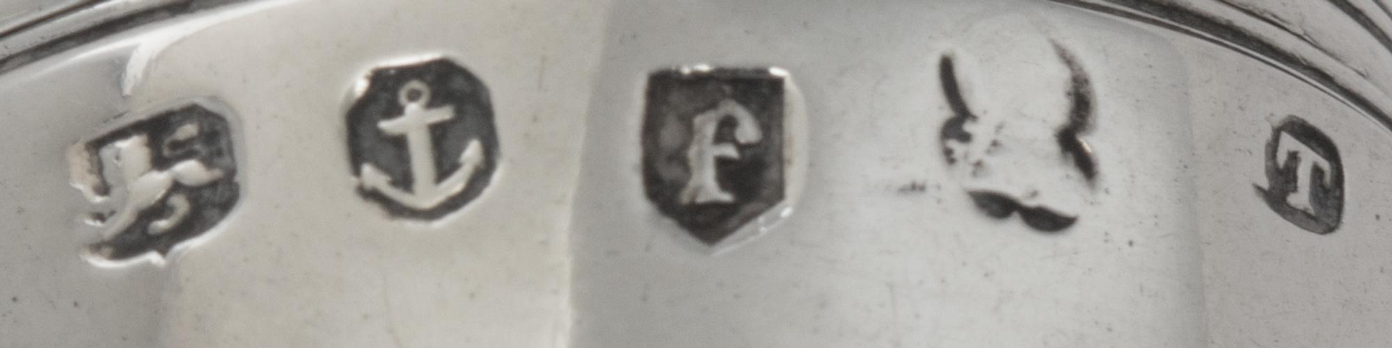 A George III Silver Nutmeg Grater, Likely John Thornton, Birmingham, 1803, of ovoid form, the underside with engraved monogram HL.