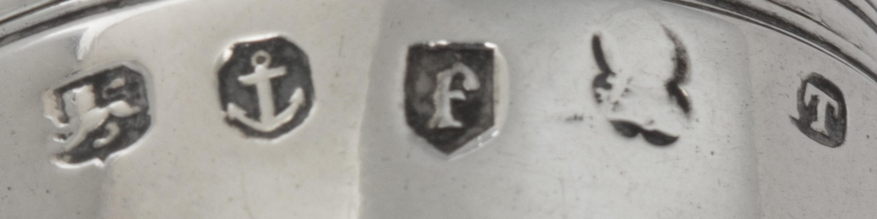 A George III Silver Nutmeg Grater, Likely John Thornton, Birmingham, 1803, of ovoid form, the underside with engraved monogram HL.