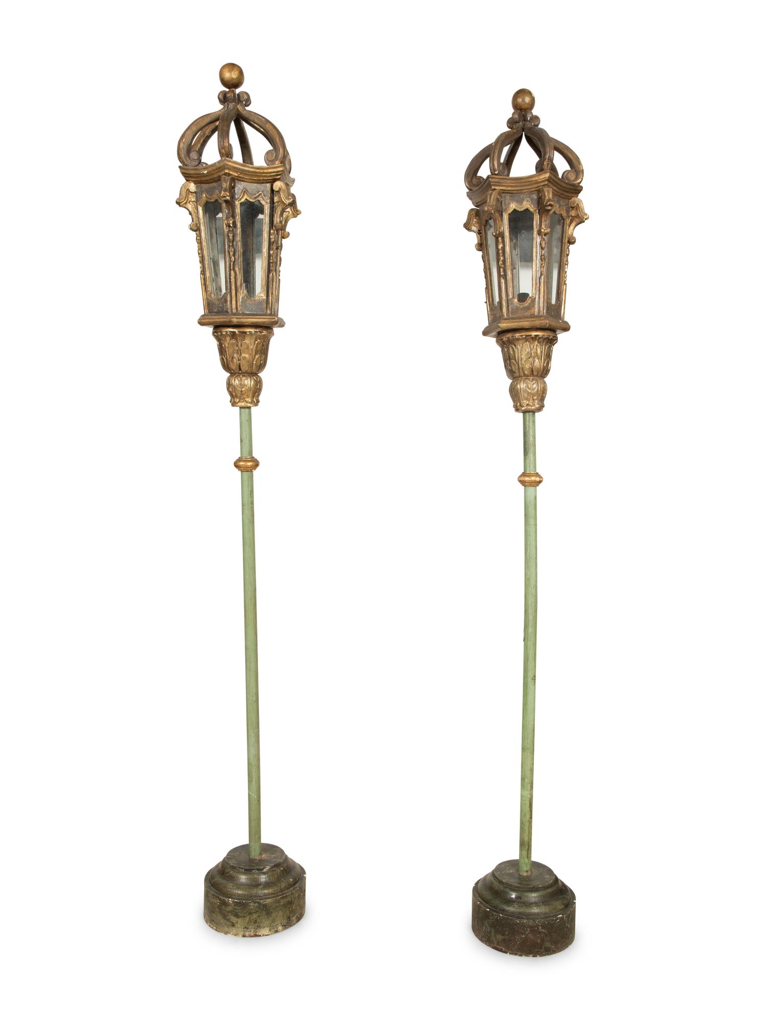 A Pair of Venetian Painted and Parcel Gilt Gondola Lanterns in Marblelized Bases