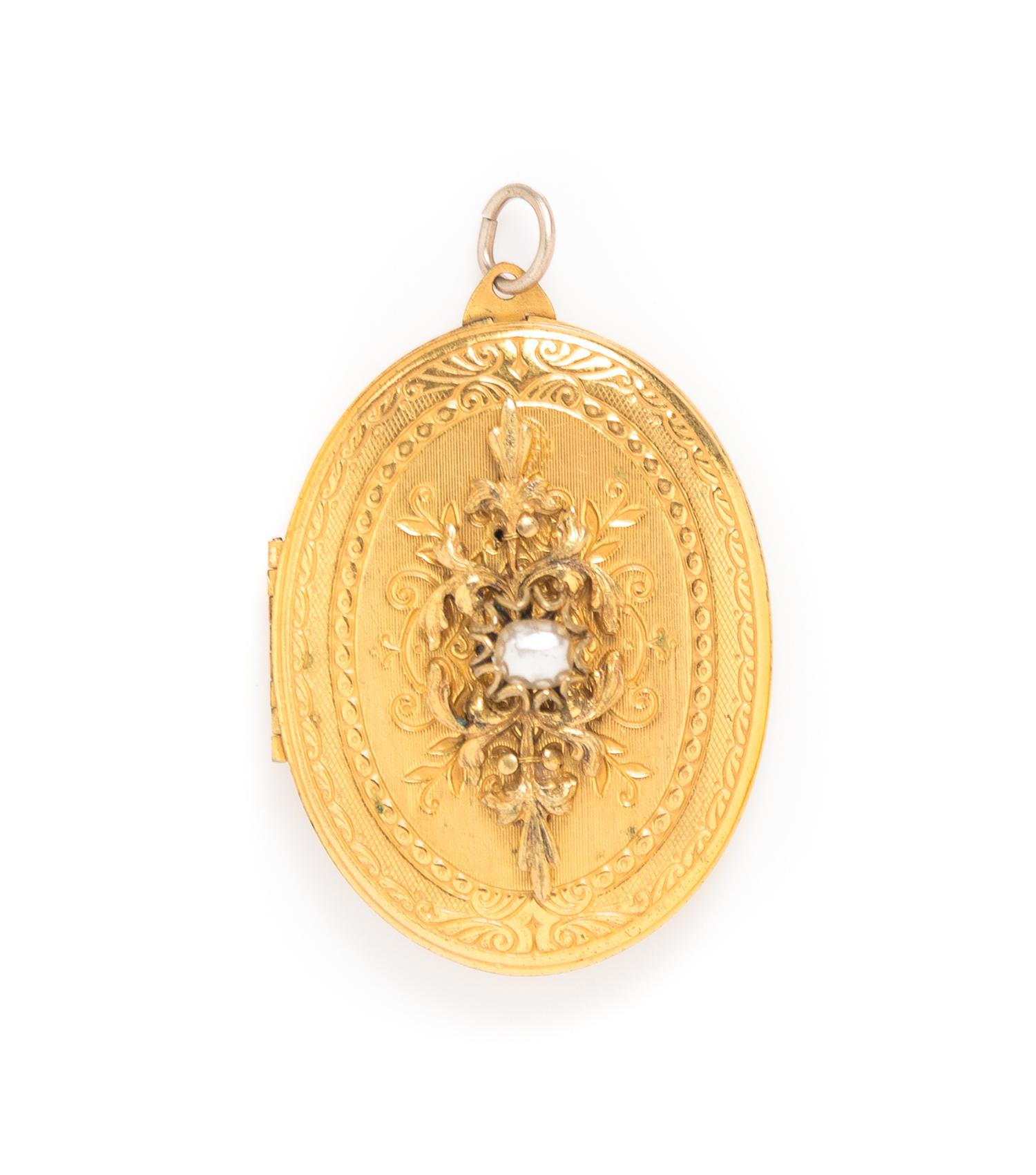 A Miriam Haskell Goldtone Oval Locket, 2.5" x 2".