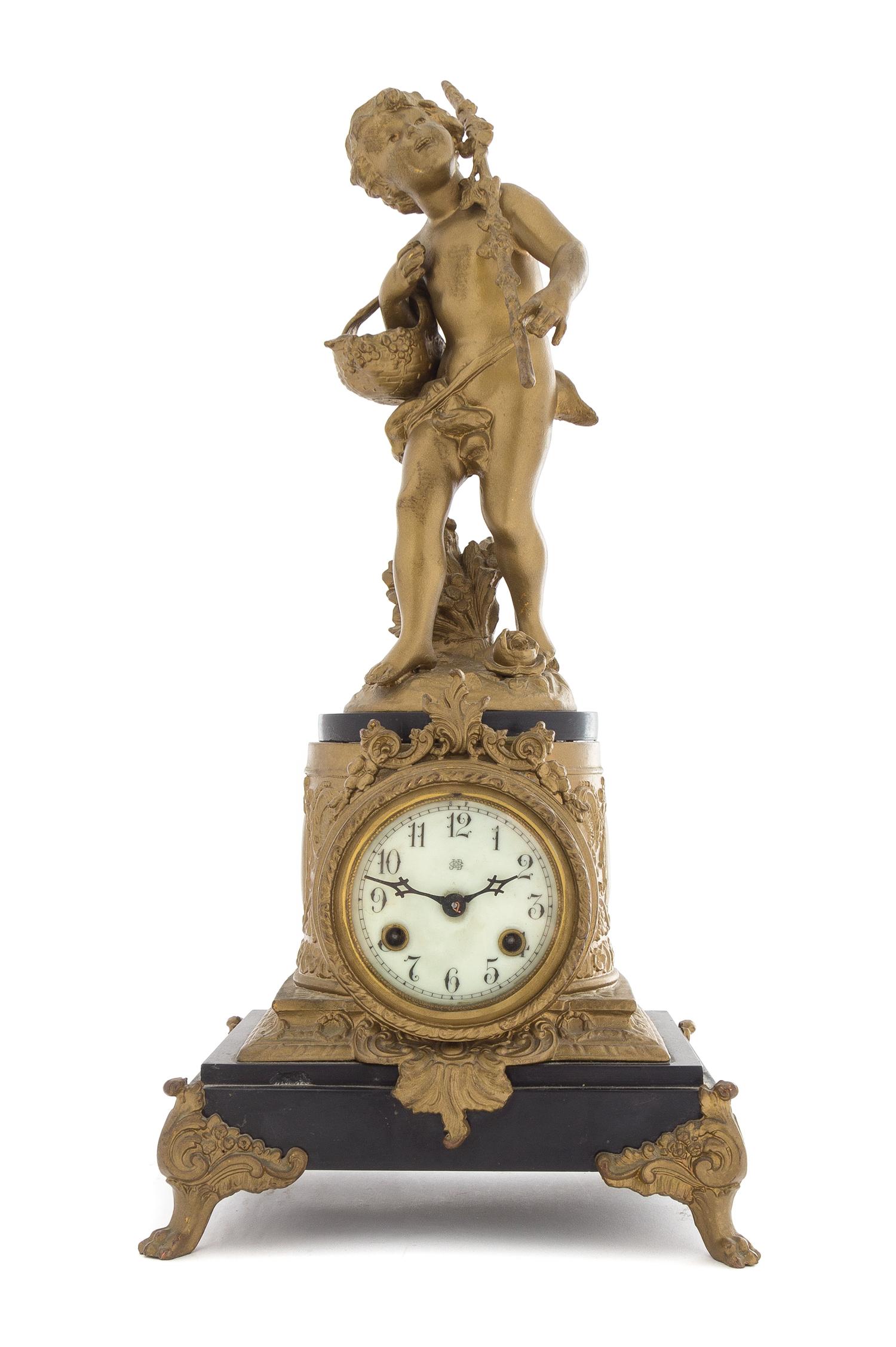 An American Gilt Metal Figural Mantel Clock Height 18 1/2 inches. — JENNINGS BROS., BRIDGEPORT, CONNECTICUT, CIRCA 1890