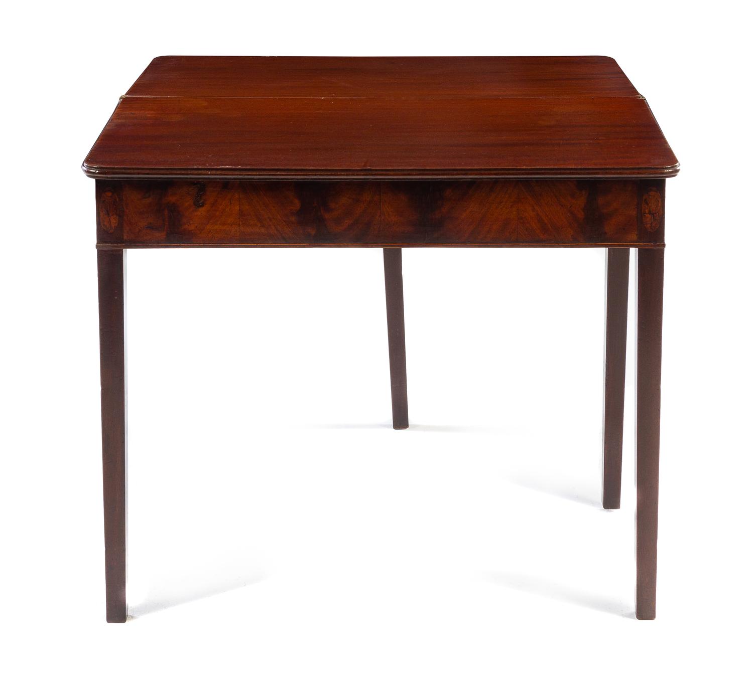 A George III Mahogany Flip-Top Game Table Height 29 x width 35 1/2 x depth 17 3/4 inches. — 19TH CENTURY