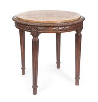 A Louis XVI Style Occasional Table Height 29 1/2 x diameter 23 inches.