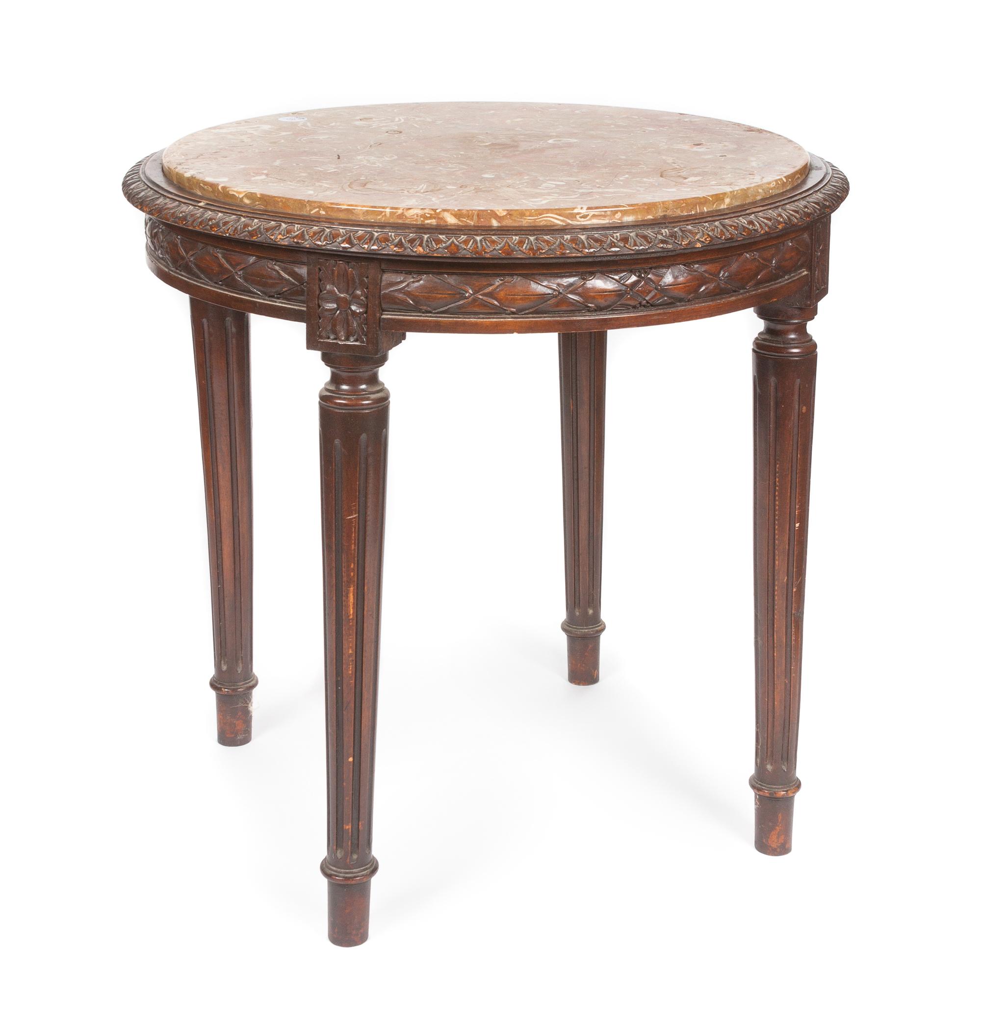 A Louis XVI Style Occasional Table Height 29 1/2 x diameter 23 inches.