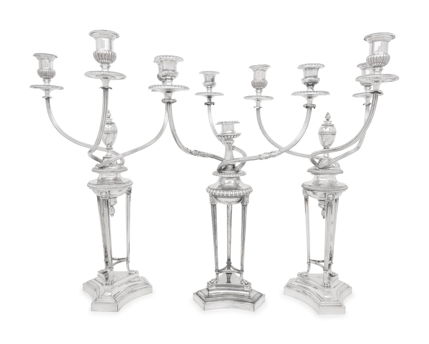 A Set of Three Silver-Plate Three-Light Candelabra