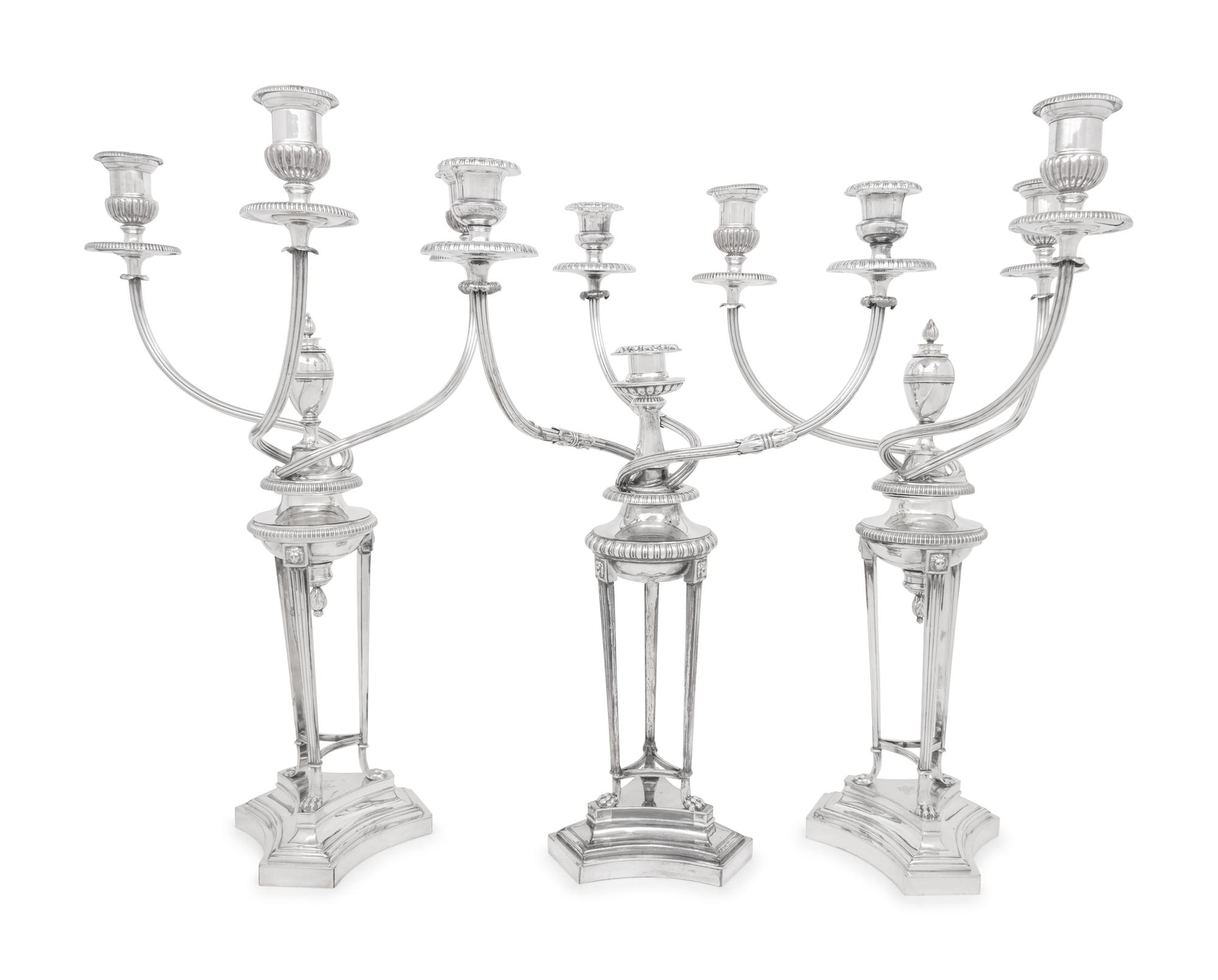 A Set of Three Silver-Plate Three-Light Candelabra