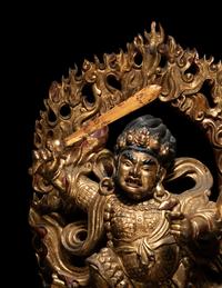 A Large Sino-Tibetan Gilt and Polychrome Lacquered Carved Wood Figure of a Dharmapala