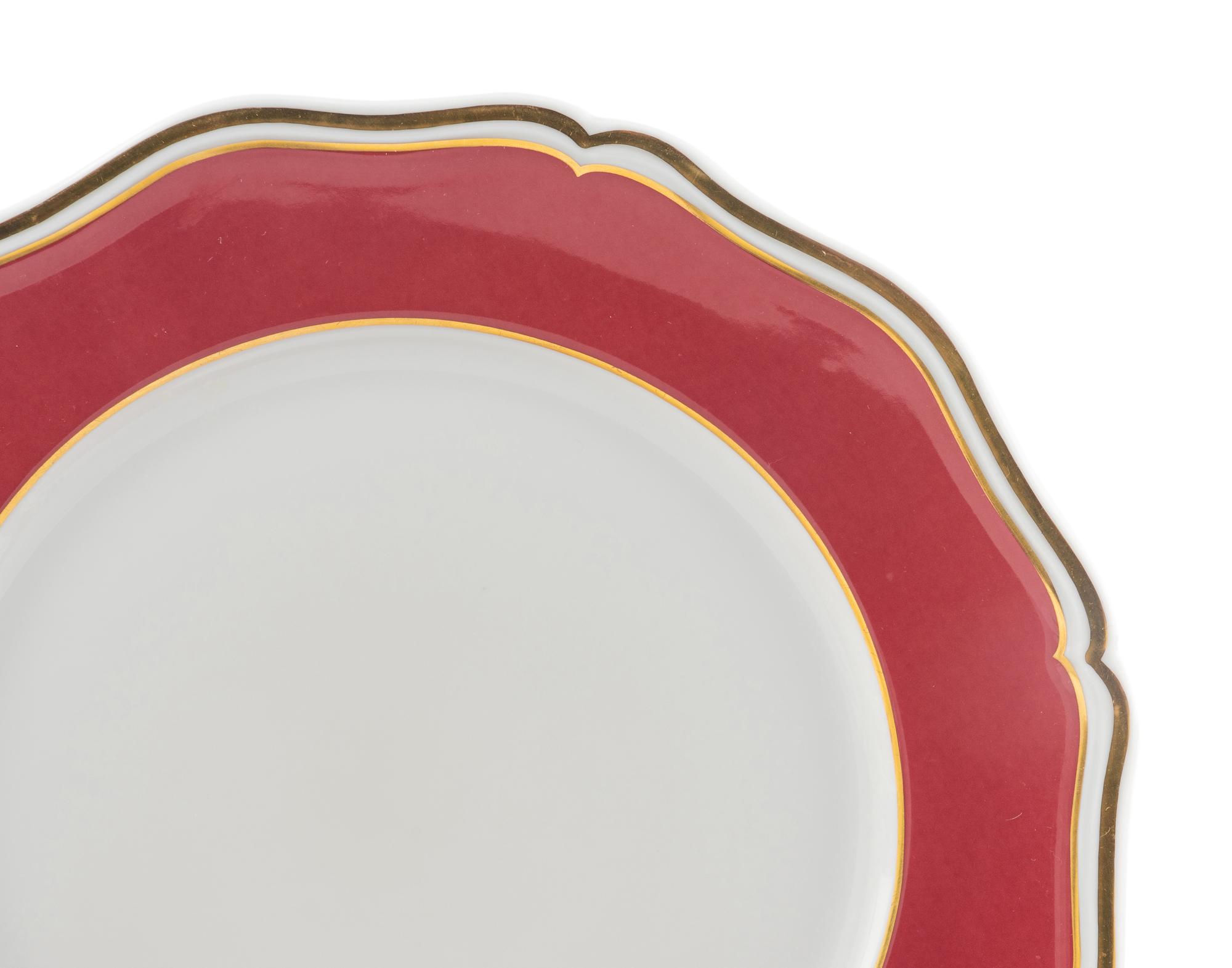 A Set of Twenty Eight A. Raynaud & Co. Limoges Polka Dinner Plates
