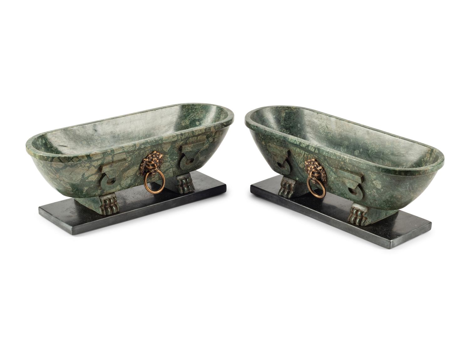 A Pair of Grand Tour Style Marble Sarcophagi