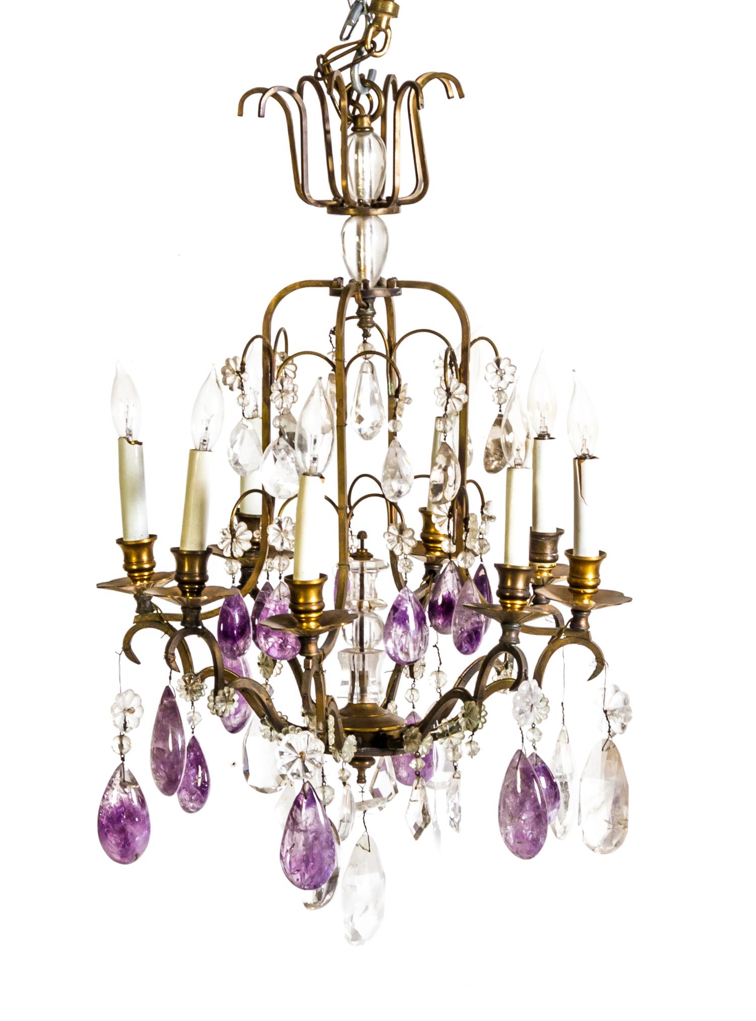 A French Gilt Bronze, Rock Crystal and Amethyst Eight-Light Chandelier, Height 26 x diameter 17 1/4 inches.