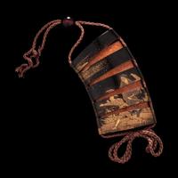 A Japanese Gold Decorated Roiro Four-Case Inro