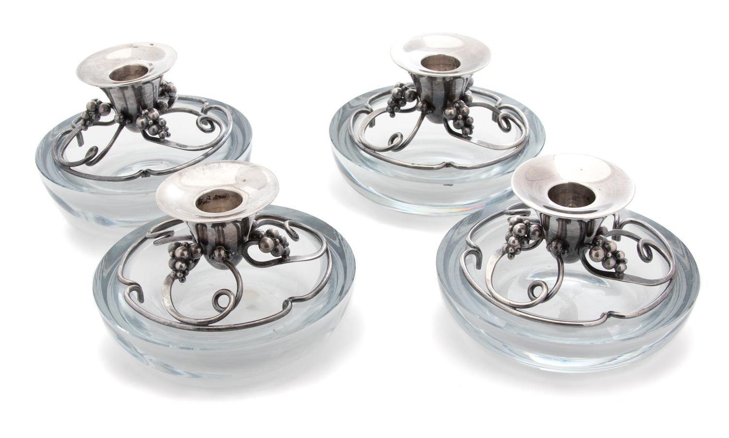 A Set of Four Danish Silver and Glass Candlesticks