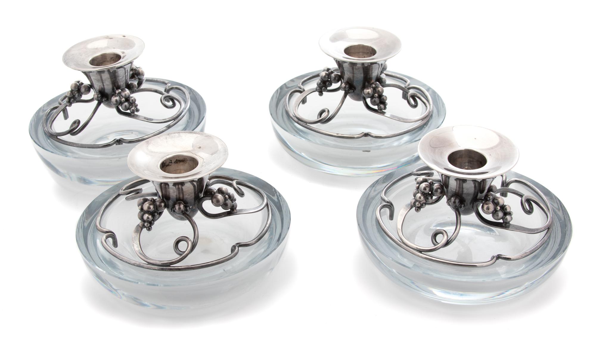 A Set of Four Danish Silver and Glass Candlesticks