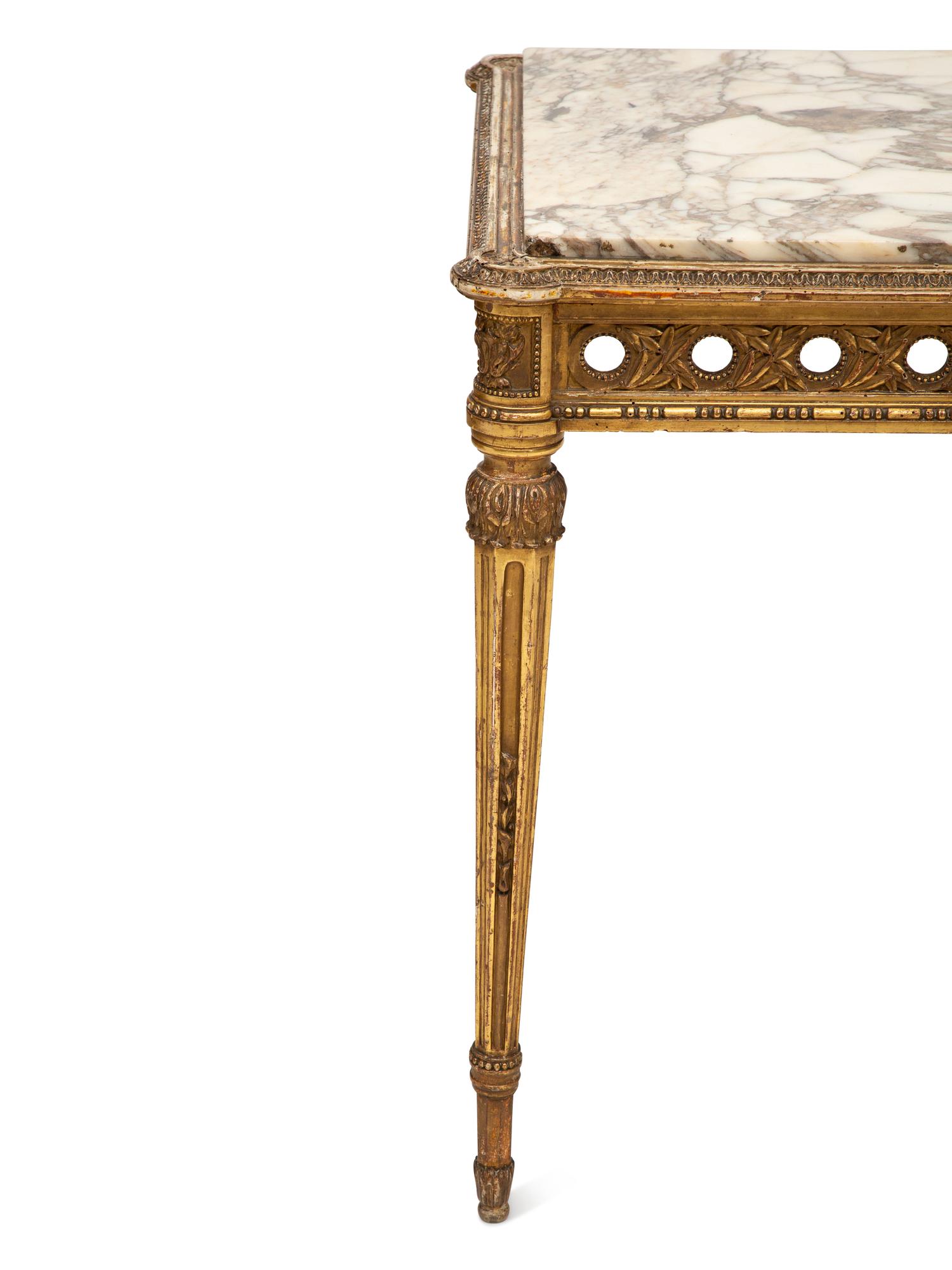 A Louis XVI Style Marble Top Giltwood Center Table