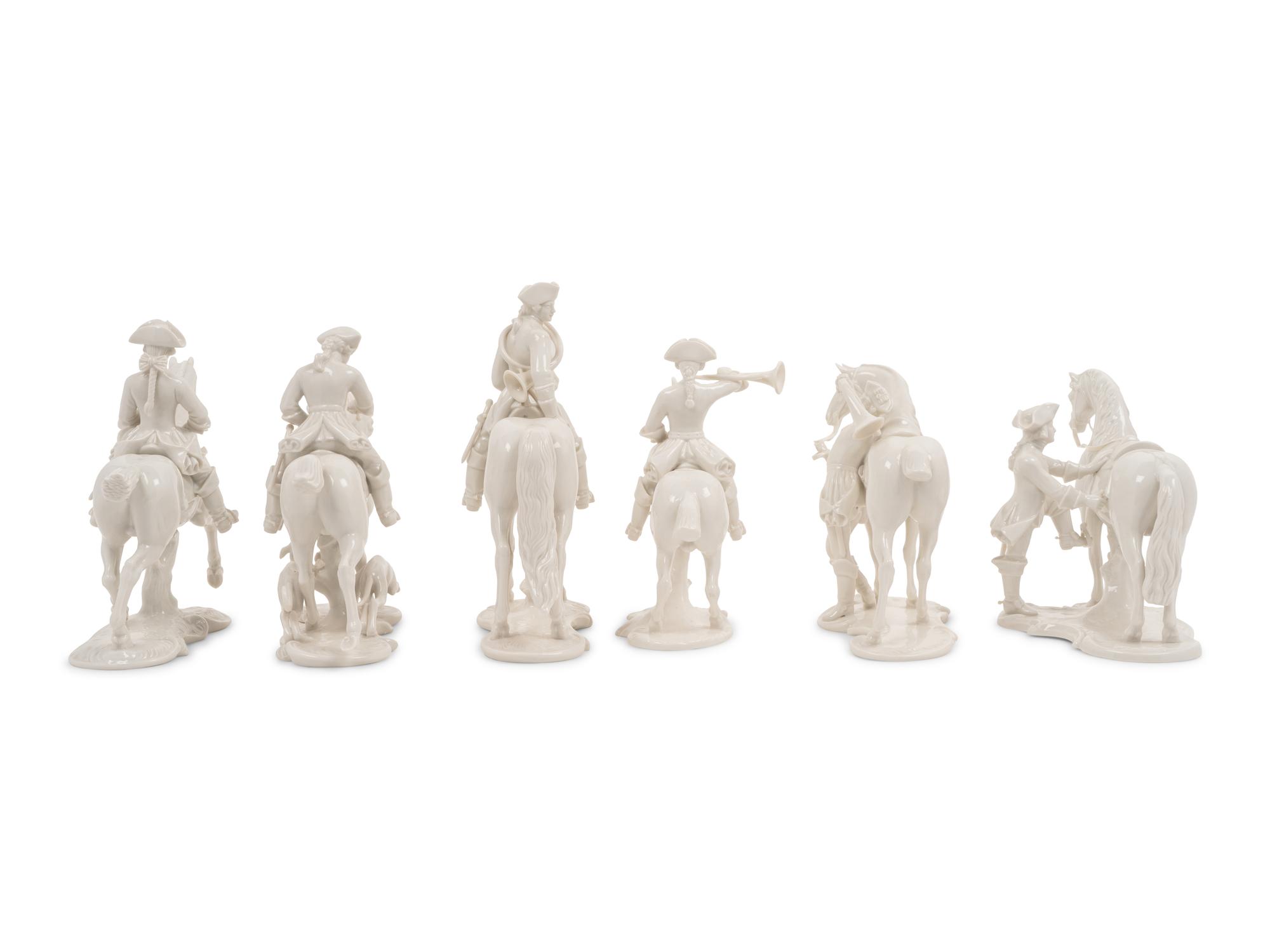 A Group of Twelve Nymphenburg Porcelain Equestrian Groups