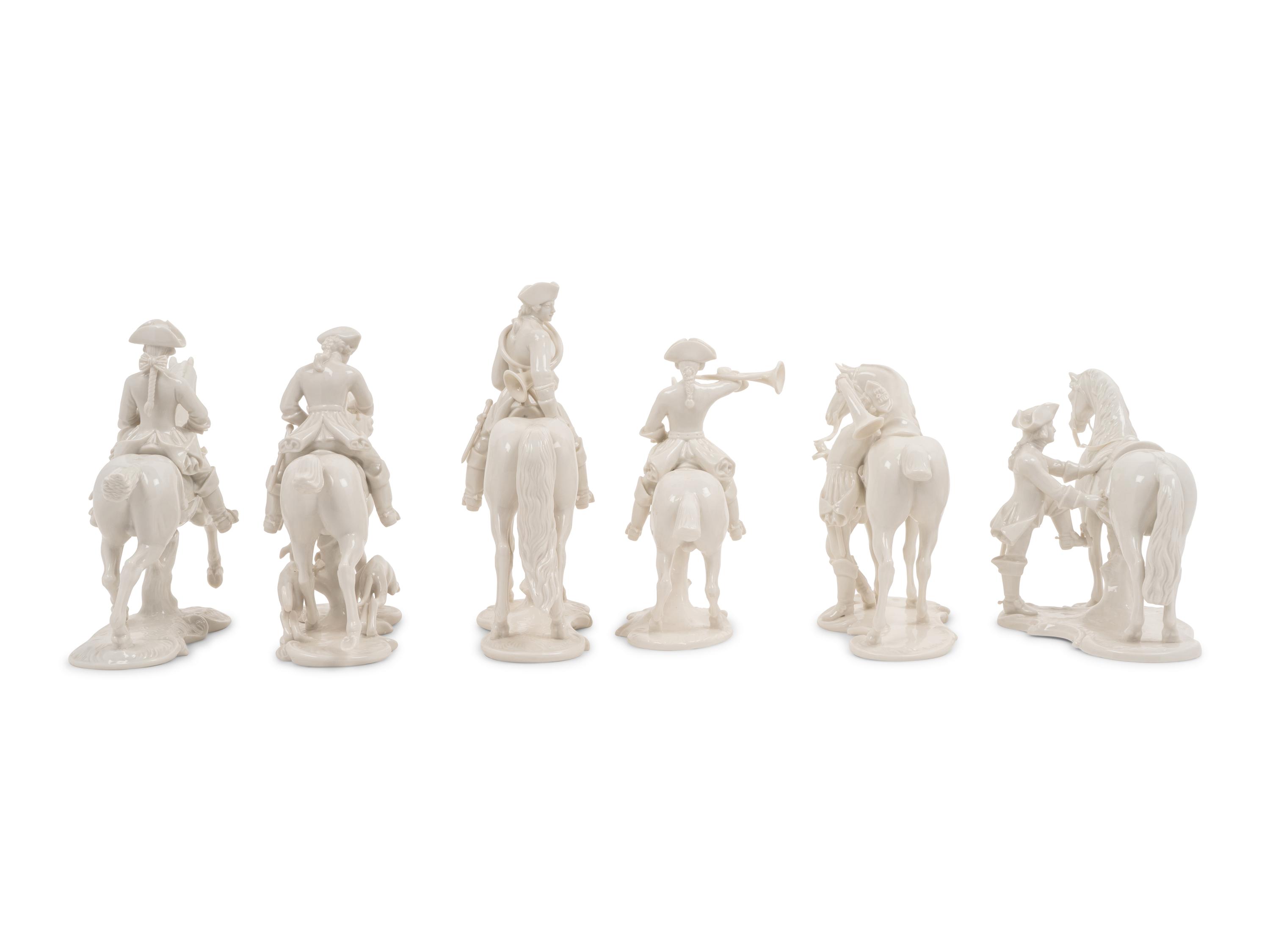 A Group of Twelve Nymphenburg Porcelain Equestrian Groups