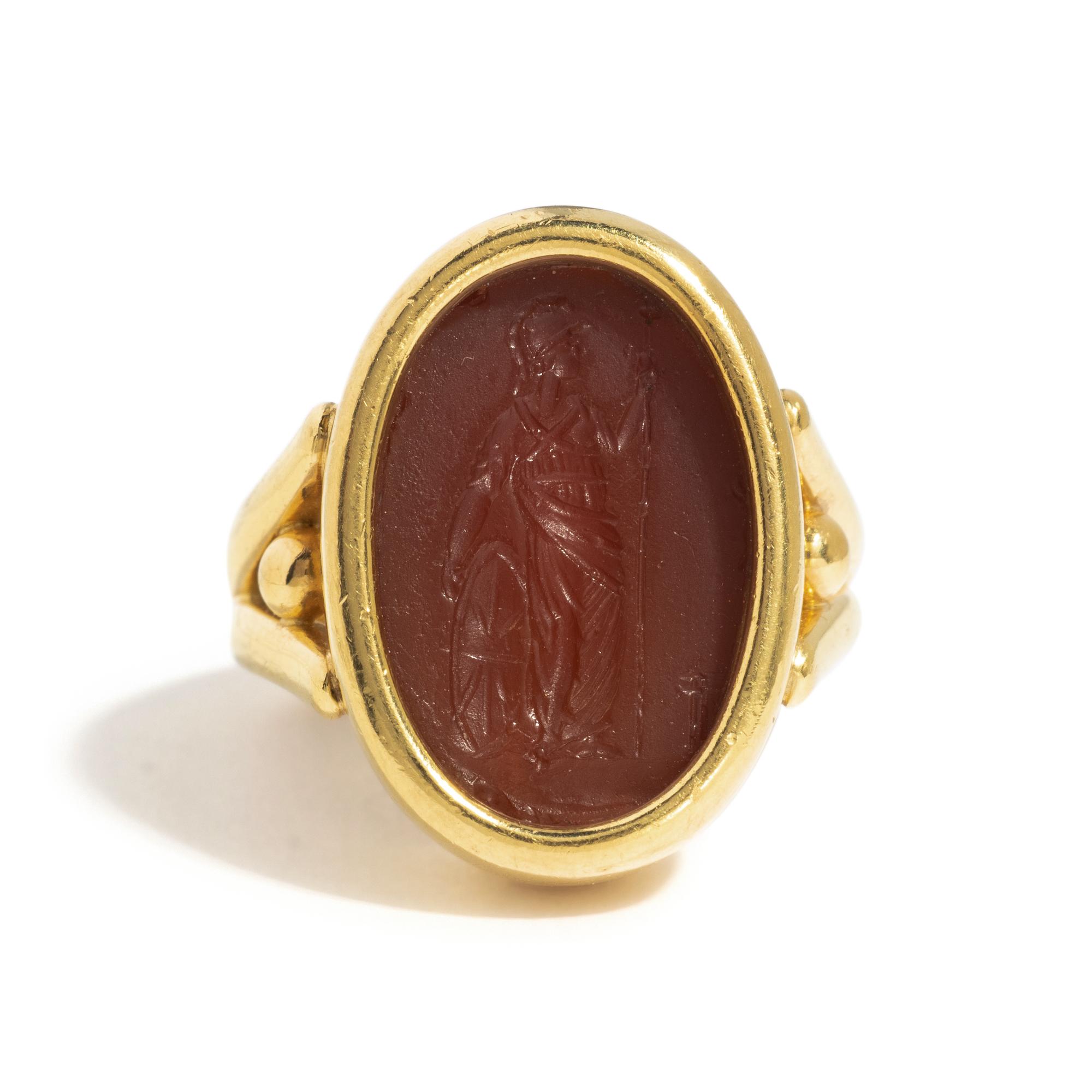 A Roman Carnelian Ring Stone with the Goddess Minerva — Set in a gold ring