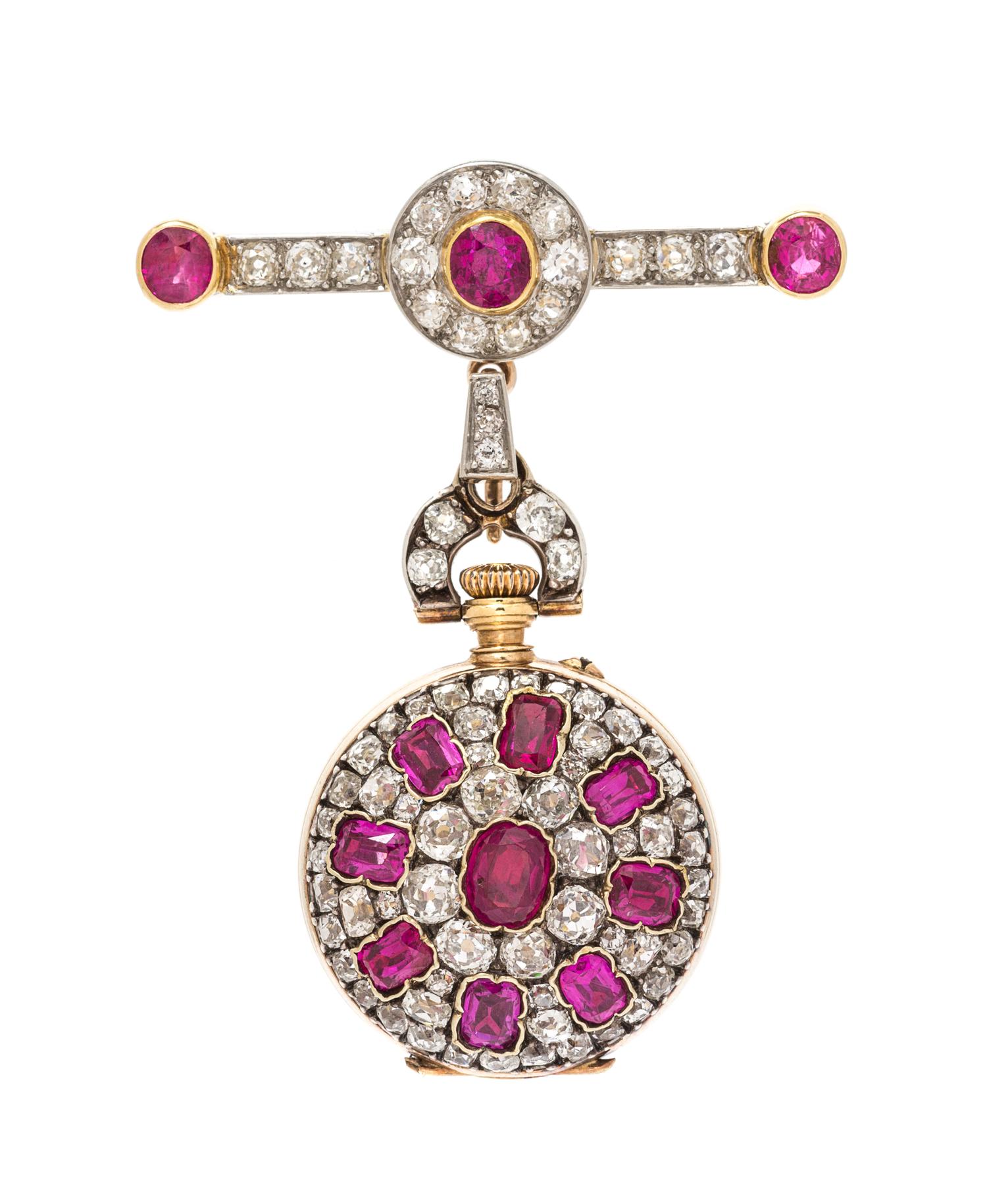 An Antique Platinum and Silver Topped Yellow Gold, Ruby and Diamond Open Face Lapel Watch, 20.40 dwts.