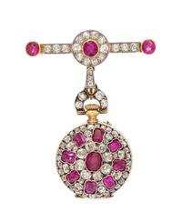 An Antique Platinum and Silver Topped Yellow Gold, Ruby and Diamond Open Face Lapel Watch, 20.40 dwts.