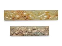 Two Chinese Carved Celadon and Russet Jade Scroll Weights
