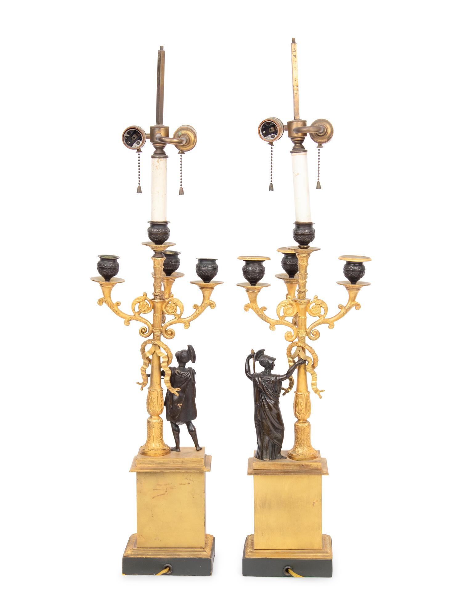 A Pair of Empire Gilt and Patinated Bronze Four-Light Candelabra