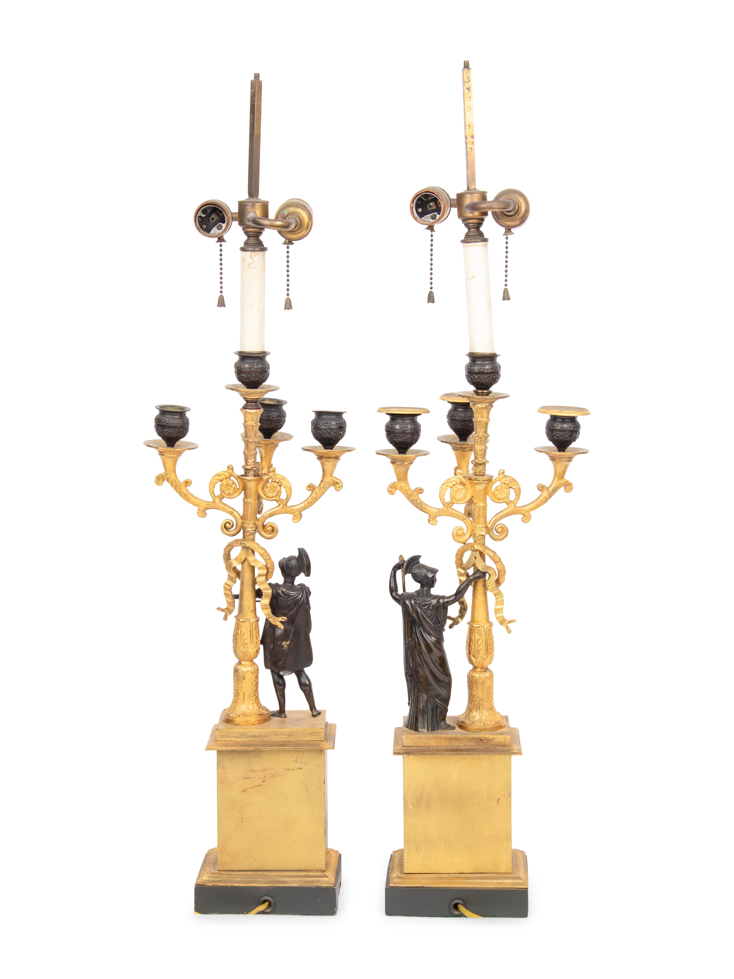 A Pair of Empire Gilt and Patinated Bronze Four-Light Candelabra
