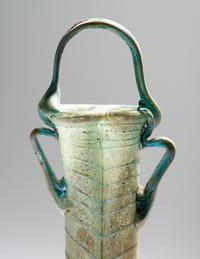 A Roman Green Glass Double Unguentarium