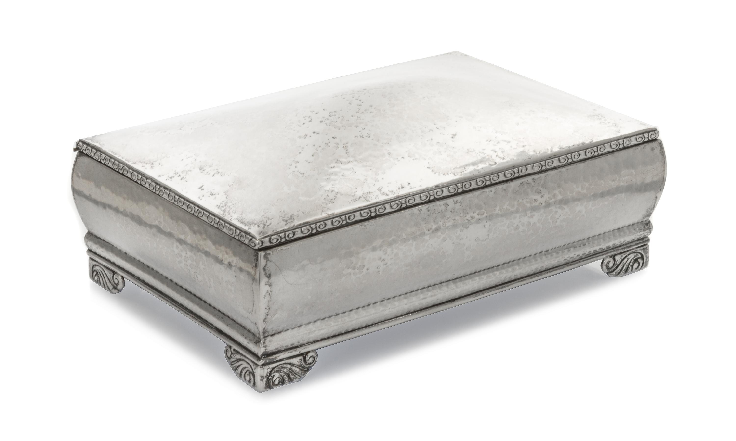 A Danish Silver Humidor, Christian F. Heise, Copenhagen, 1926, the rectangular box with bombe sides and domed lid, spot-hammered exteri