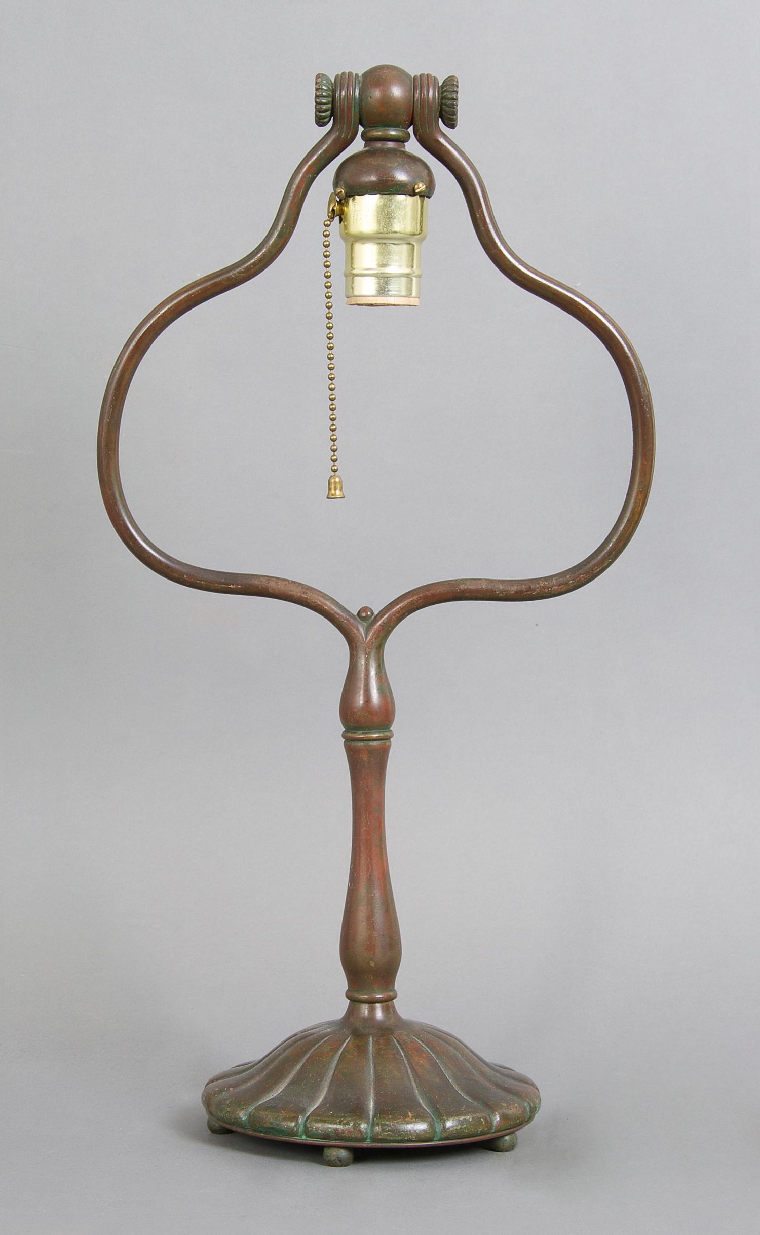 A Tiffany Studios Bronze Harp Lamp Base, Height 17 3/4 inches.